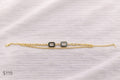 Pulsera Acero Dorada Cuadros Negros